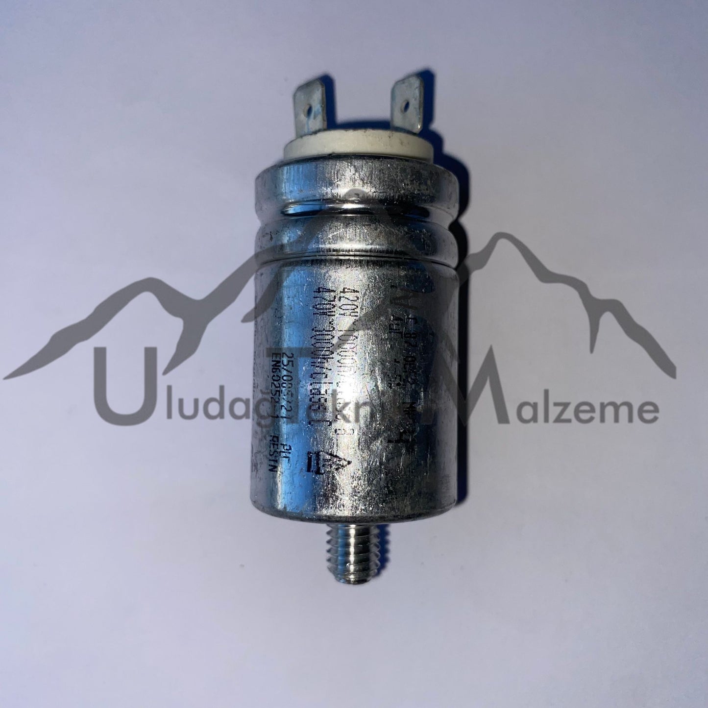 4 MF CAPACITOR ROUND